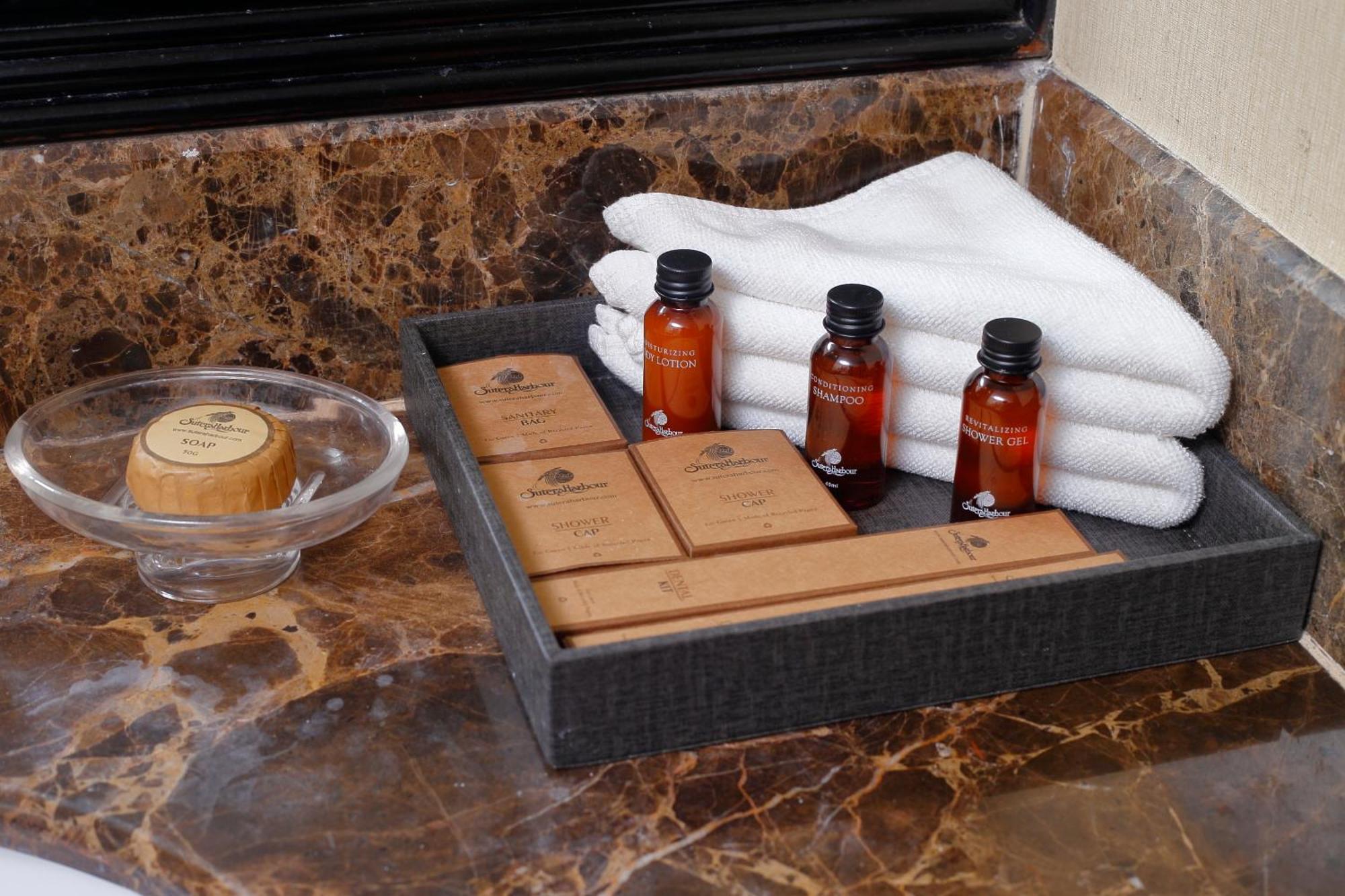 Hotel The Pacific Sutera Kota Kinabalu Exteriér fotografie A selection of toiletries in a hotel bathroom